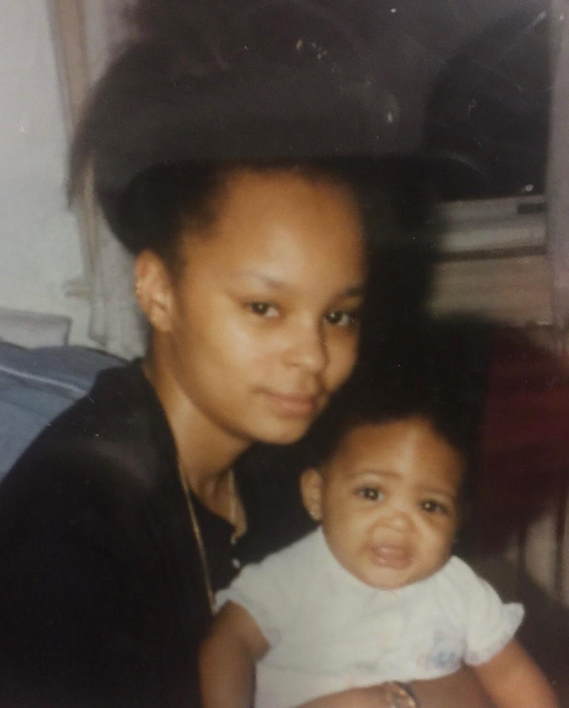 Sonya holding a baby close