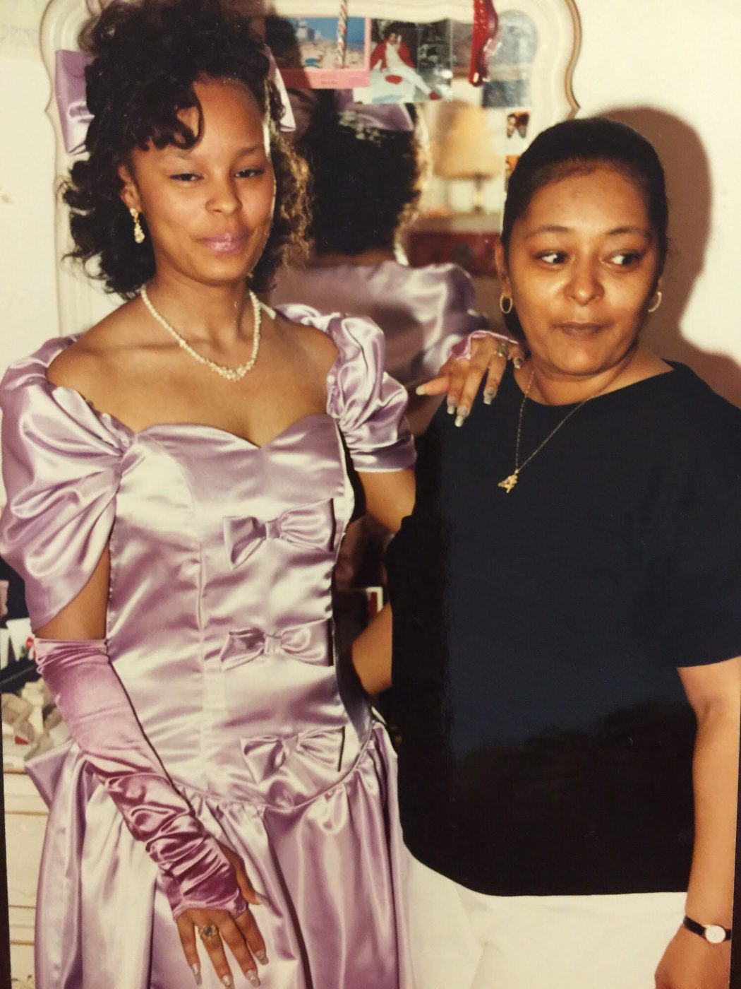 Sonya in her lavender gown with family before prom